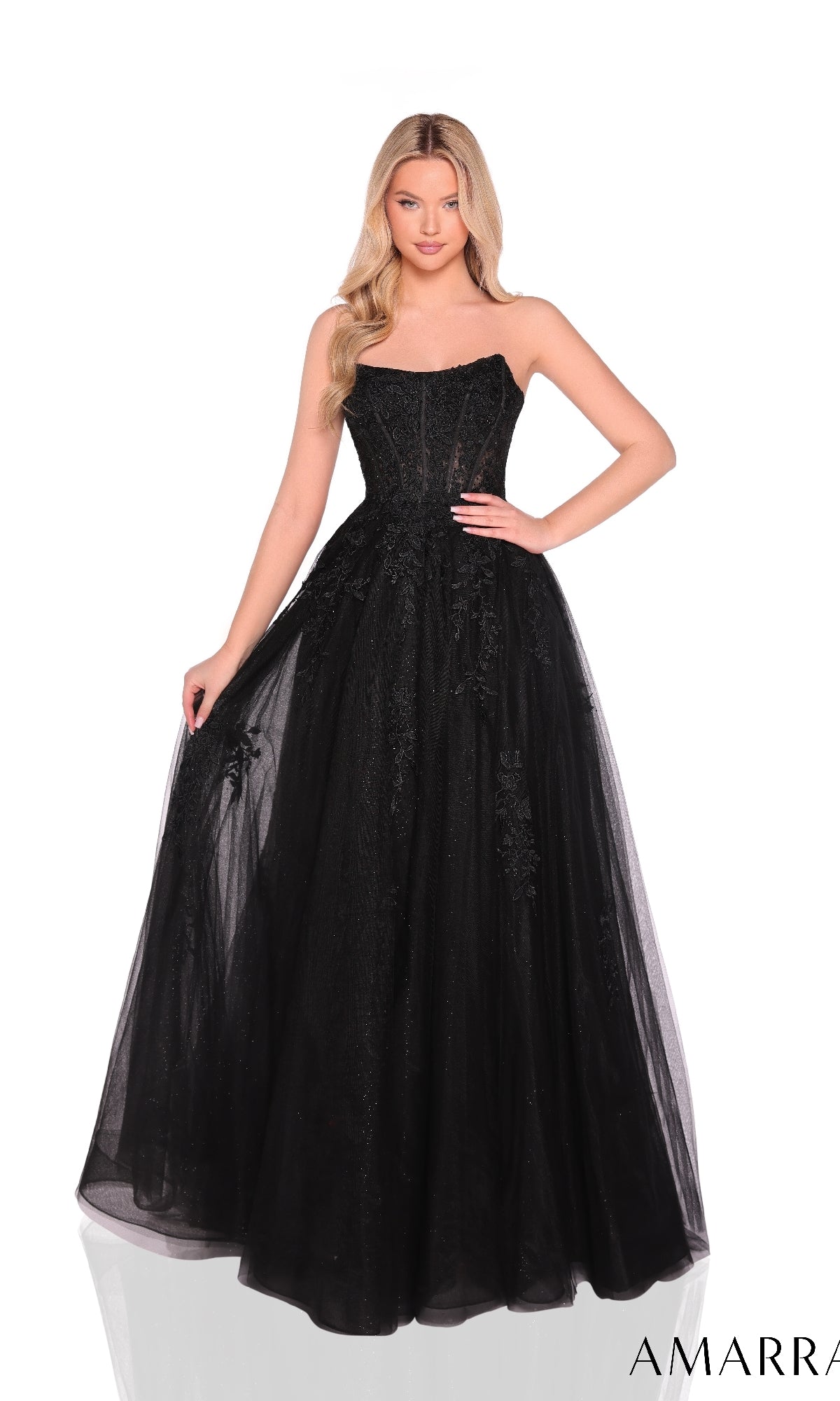 Woman wearing the Strapless Embroidered Prom Ball Gown: Amarra 88950, featuring a fitted bodice and full tulle skirt, poses against a white background.
